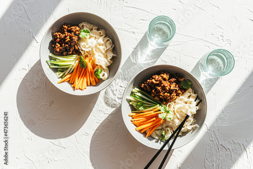 vegan black bean noodles in bowl photo