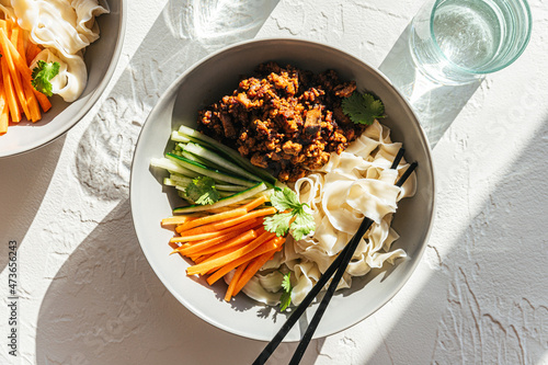 vegan black bean noodles in bowl photo