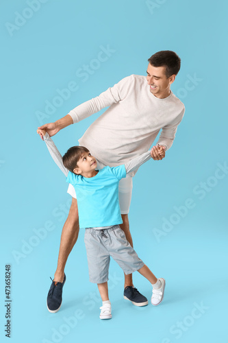 Dancing man and his little ...