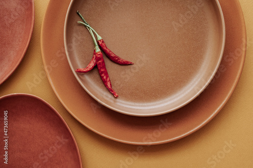 Plates and chili peper photo