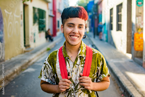 Latino trans man with split color hairstyle photo
