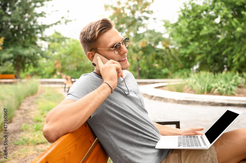 Young man in sunglasses wit...