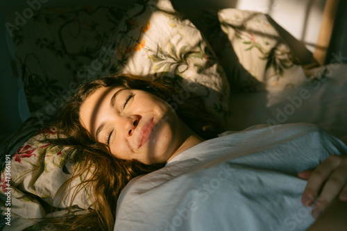 Beautiful woman sleeping at dawn