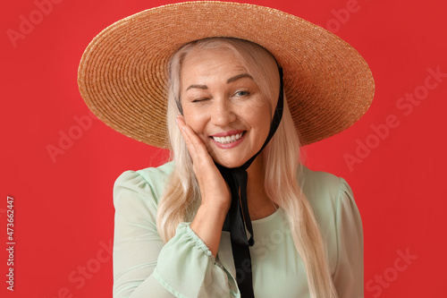 Smiling mature woman in str...