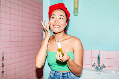 Asian Woman in Bathroom