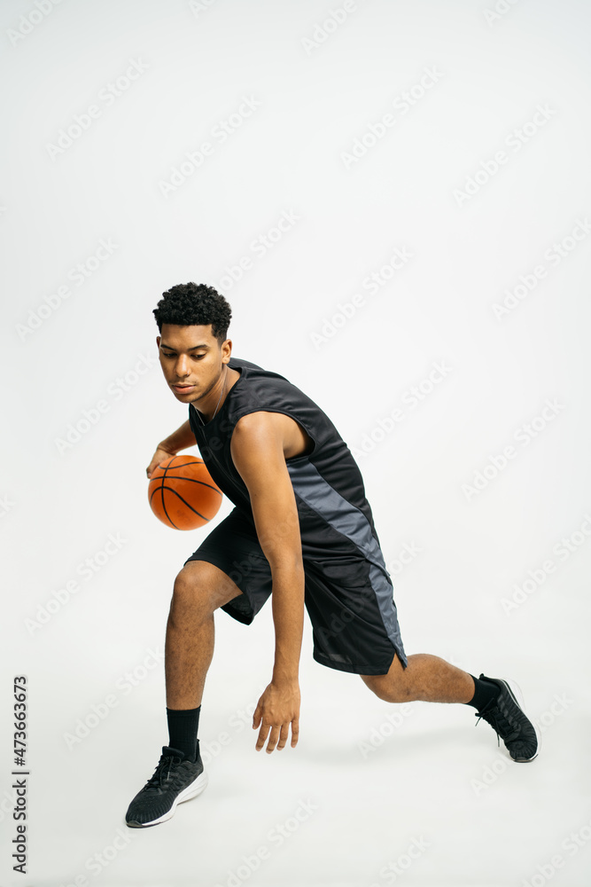 Black basketball player in studio Black basketball player in studio