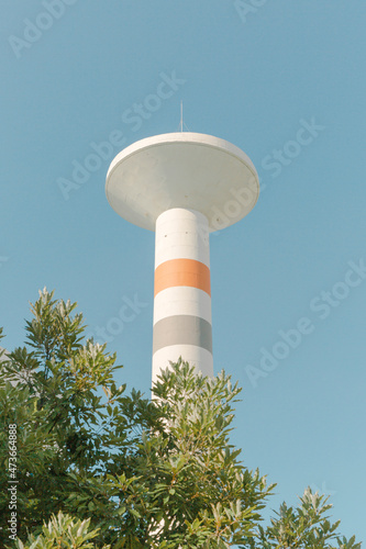 Trees and water towers photo