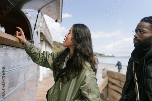 Couple ordering Food from Itinerant Coffee Van  photo