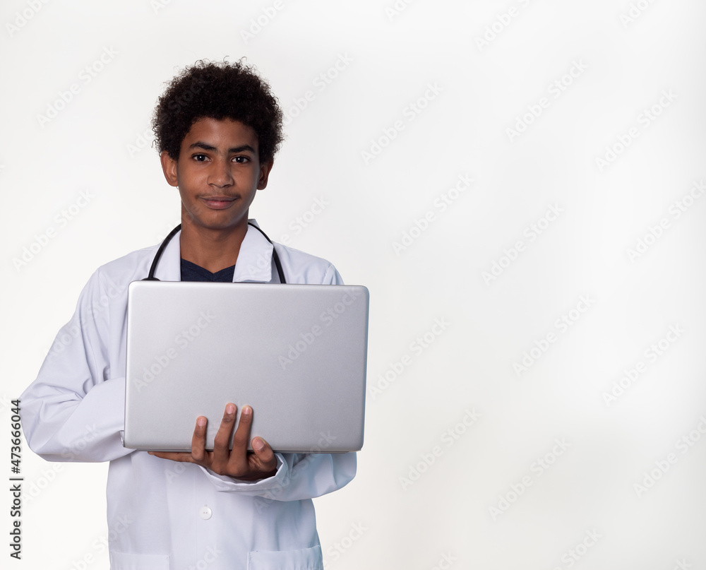 Portrait of adolescent afro latino dressed as a doctor with a stethoscope. looking the camera health, technology concept Portrait of adolescent afro latino dressed as a doctor with a stethoscope. looking the camera health, technology concept