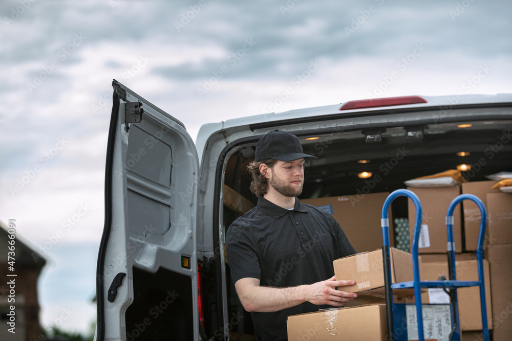 Shipment: Man Getting Boxes Out Of Delivery Van Shipment: Man Getting Boxes Out Of Delivery Van