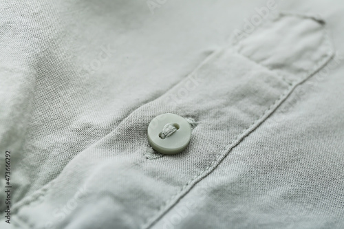 Button on stylish shirt, closeup