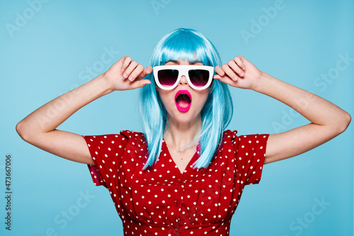 pretty woman fashion blue wig posing sunglasses