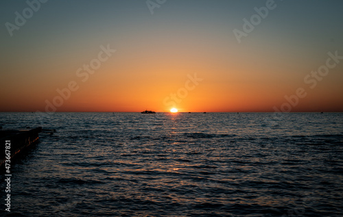 sunset over the sea © pilotrs