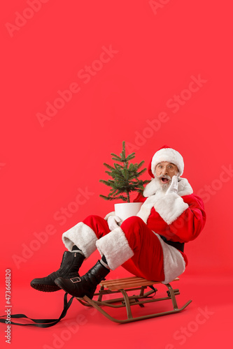 Sledding Santa Claus with C...