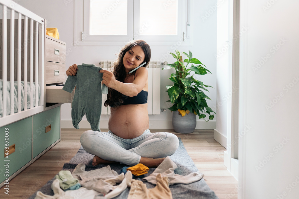 Portrait of pregnant woman using phone at home Portrait of pregnant woman using phone at home