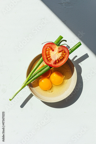 Tomato, green onion, and eggs photo