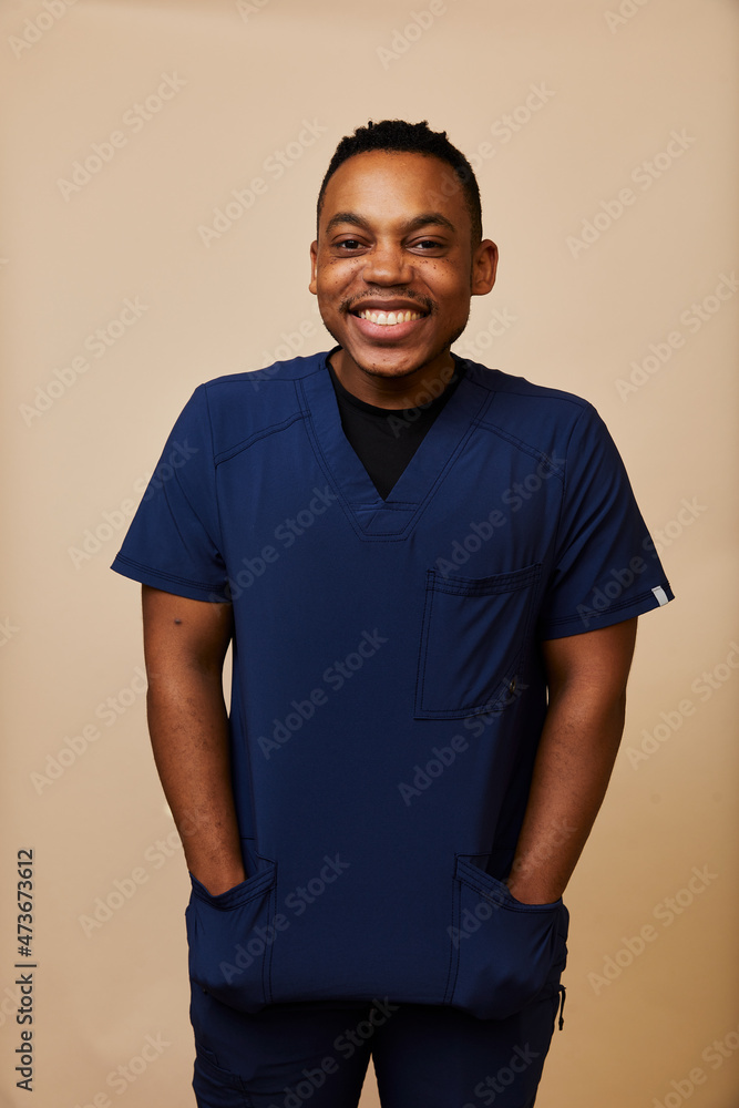 Young African American Male Nurse Holding Pill Young African American Male Nurse Holding Pill