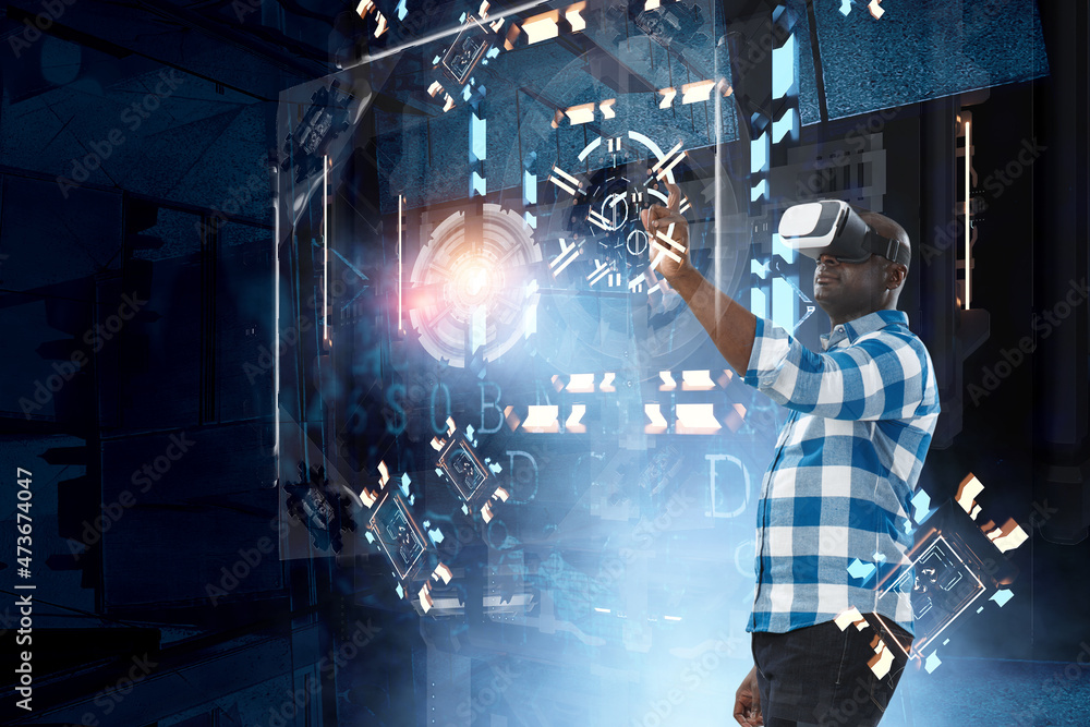 Fototapeta premium Man wearing virtual reality goggles