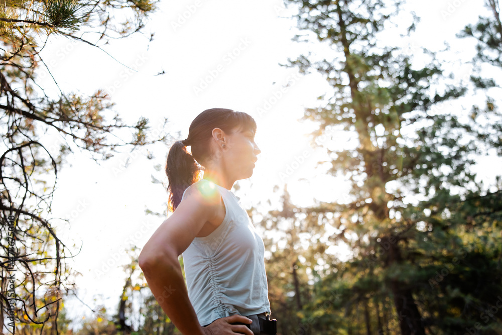 Woman outside recovering and breathing Woman outside recovering and breathing