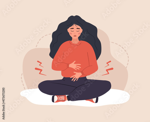 Menstrual pain. Sad woman with abdominal cramps or pms symptoms. Female critical day problems. Vector illustration in flat cartoon style. photo