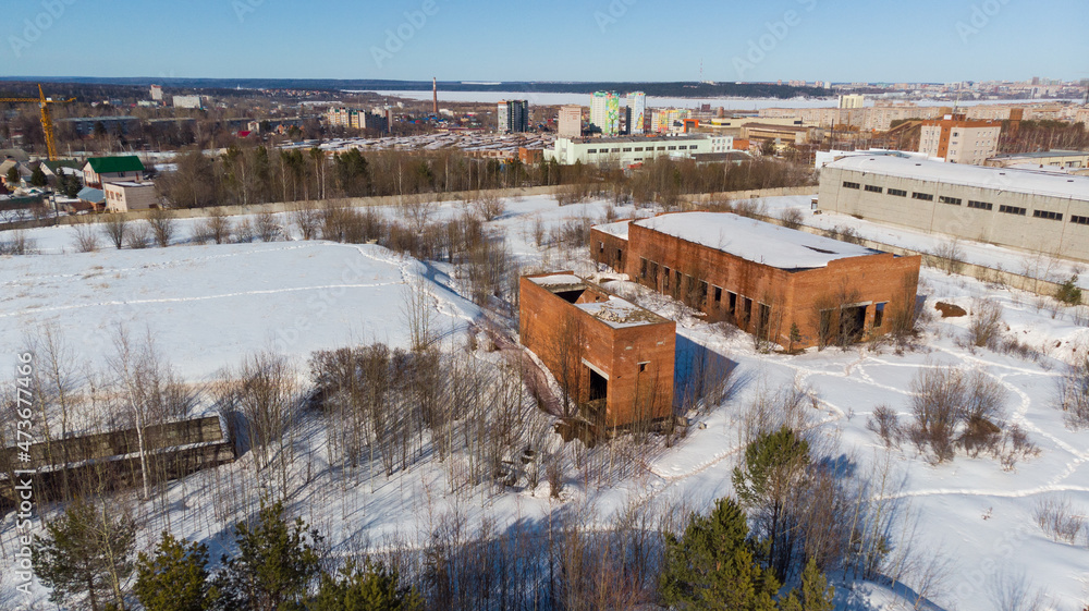 aerial view of unfinished buildings in winter