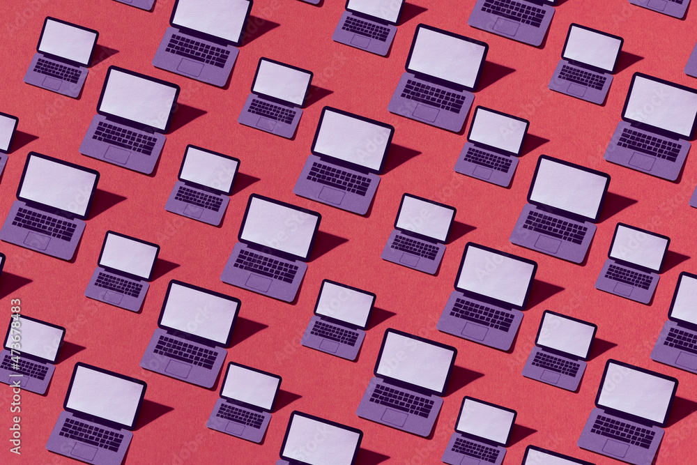 Modern laptops papercraft on pink background Modern laptops papercraft on pink background