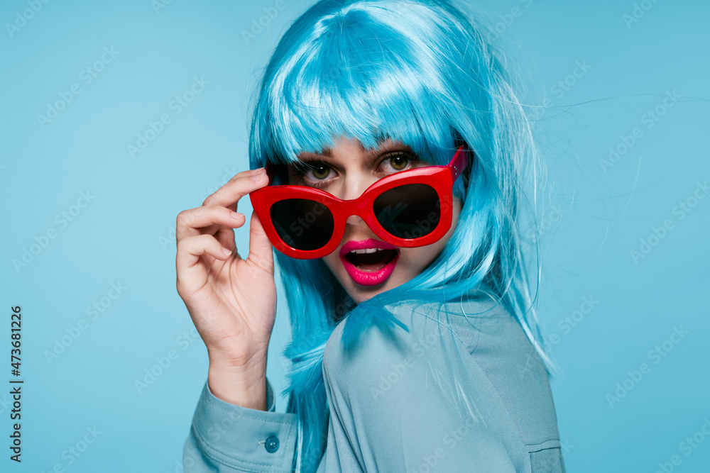 attractive woman in purple wig red glasses posing close-up attractive woman in purple wig red glasses posing close-up