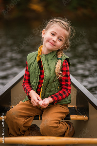 little girl on canoe photo