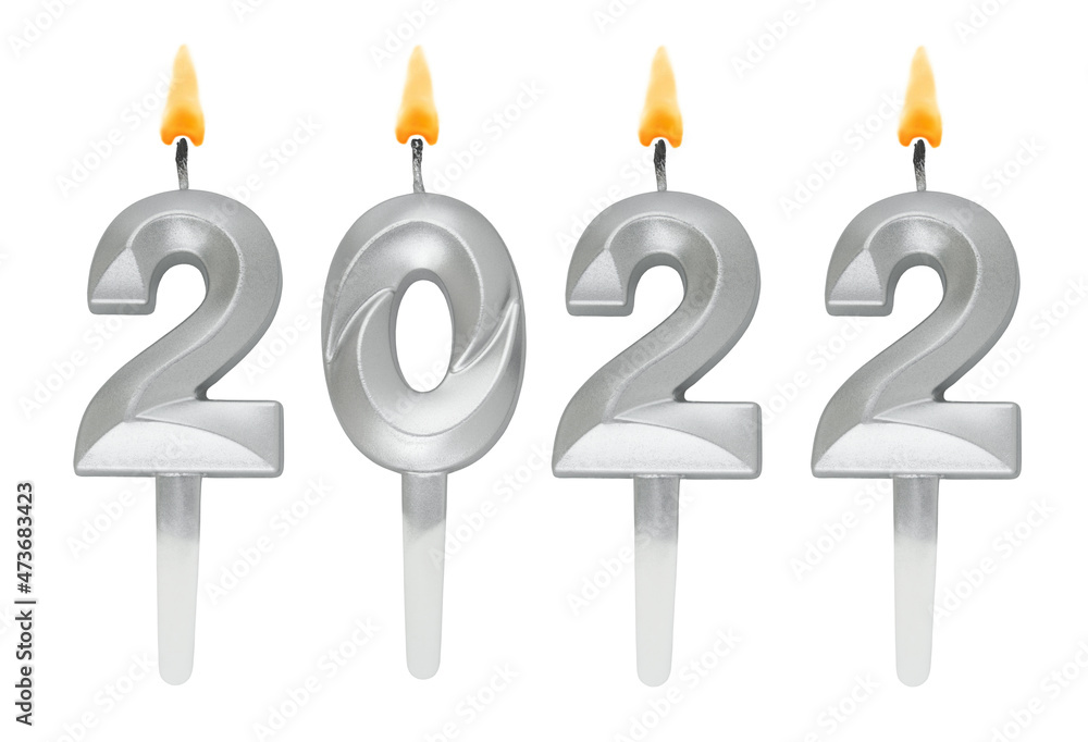 Silver candles isolated on white background, number 2022, new year concept Silver candles isolated on white background, number 2022, new year concept