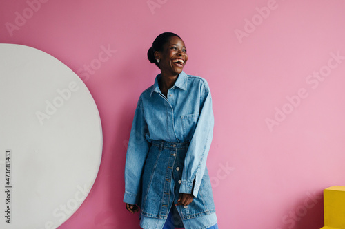 Happy studio portrait of black woman  photo