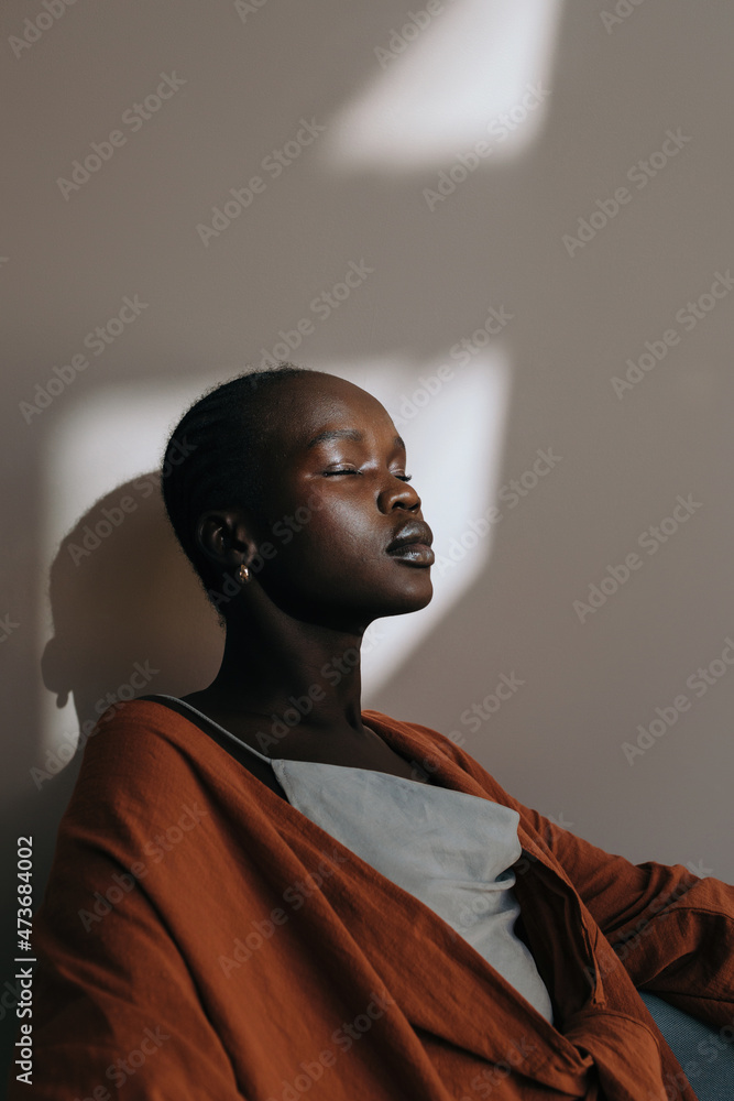 Natural portrait woman with closed eyes in sunlight Natural portrait woman with closed eyes in sunlight