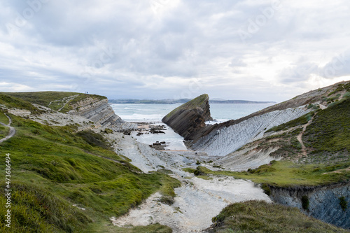 Wild Coastal rock formations in Cantabria, Spain photo