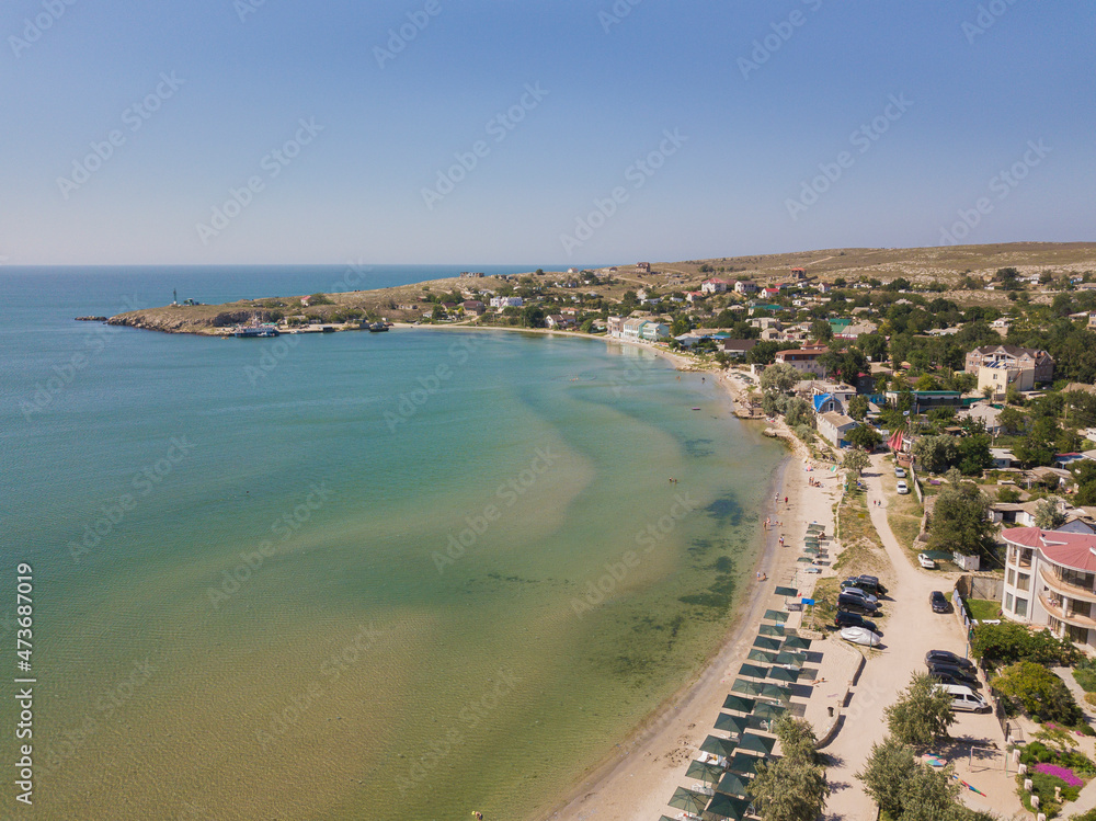 Shelkino. Crimea. Russia. Aerial view of tourists at a beach. Shelkino. Crimea. Russia. Aerial view of tourists at a beach.