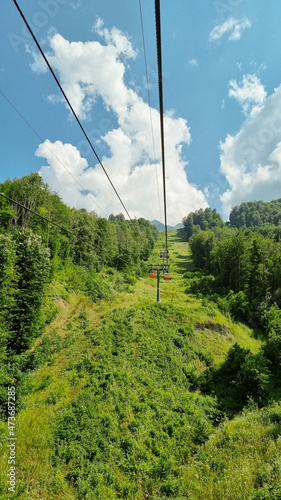 cable car in the mountains. summer tourism.