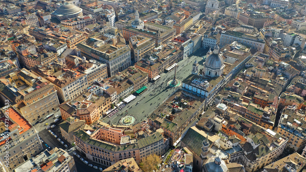 Fototapeta premium Aerial drone photo of famous elliptical Piazza Navona an elegant square dating from the 1st century A.D., with a classical fountain, street artists and bars a true tourist attraction, Rome, Italy