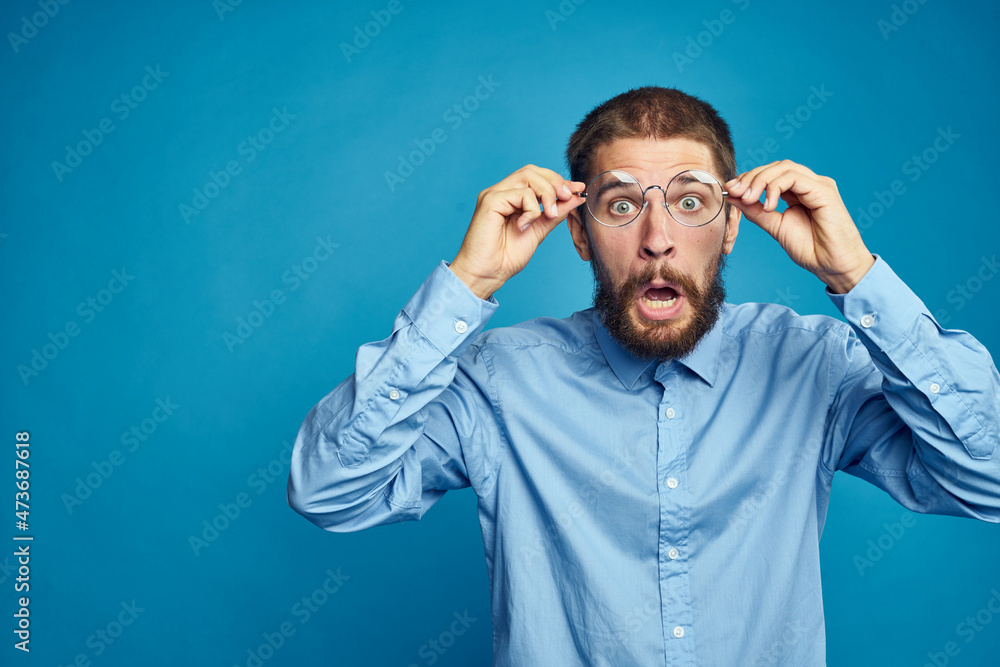 business man with glasses emotions blue background