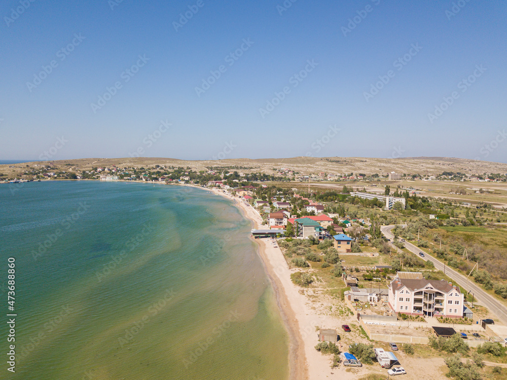 Shelkino. Crimea. Russia. Aerial view of tourists at a beach.