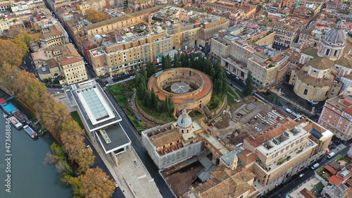 Aerial drone photo of iconic Mausoleum of Augustus  - remains of Roman emperor's circular, raised tomb, originally a grand monument with a bronze statue, Rome historic centre, Italy photo
