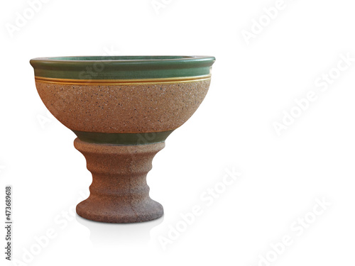 beautiful antique green and gold stone pot on brown stone saucer on white background, object, copy space
