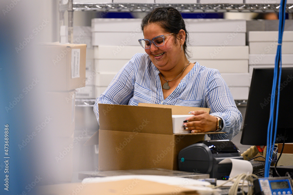 Hispanic Online Shopping worker at warehouse Hispanic Online Shopping worker at warehouse