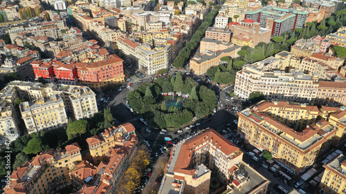 Aerial drone photo of iconic Piazza Mazzini or Mazzini square in the centre of Prati with beautiful Roman building architecture and small fountain, Rome, Italy photo