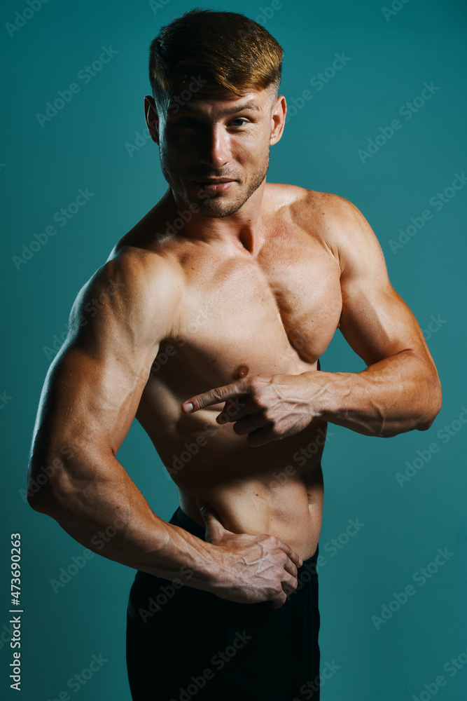 athletic man with pumped up muscular body workout green background athletic man with pumped up muscular body workout green background