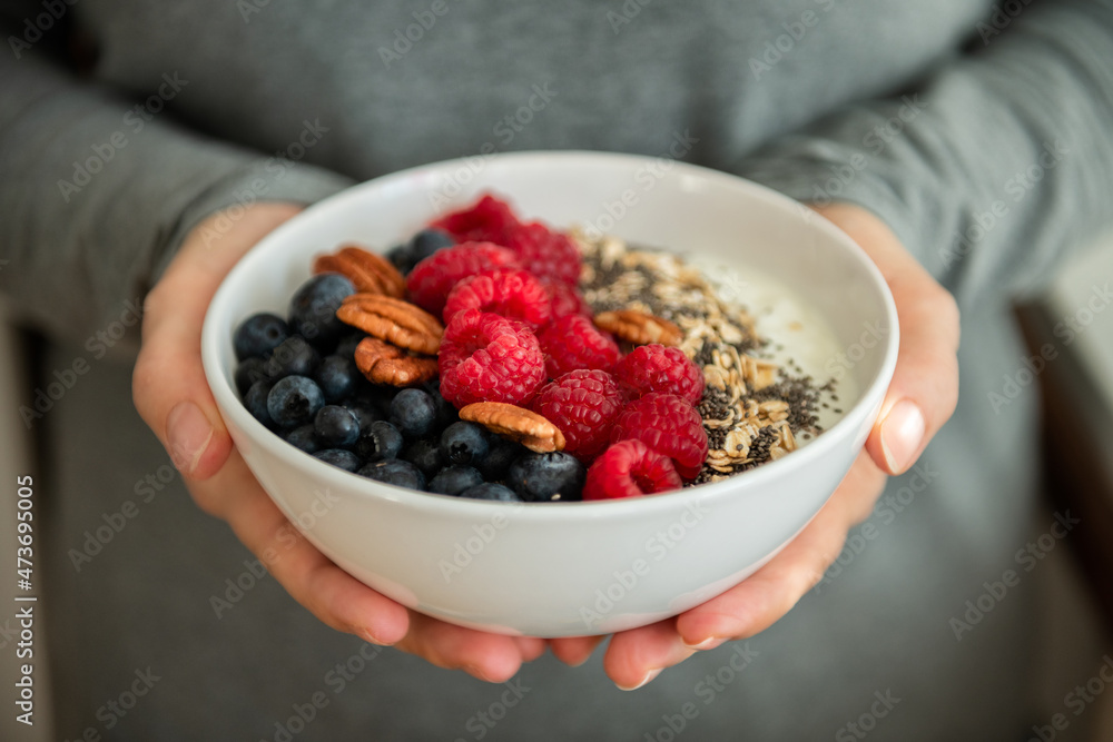 Freshly made muesli breakfast with yoghurt Freshly made muesli breakfast with yoghurt