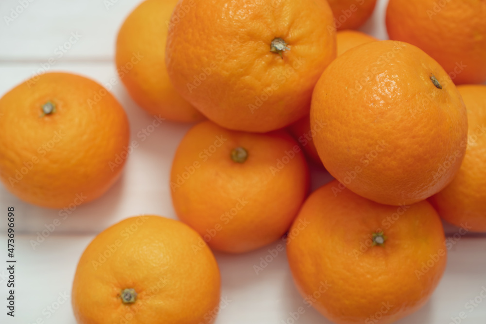 Tangerines on a white background, Christmas fruits Tangerines on a white background, Christmas fruits