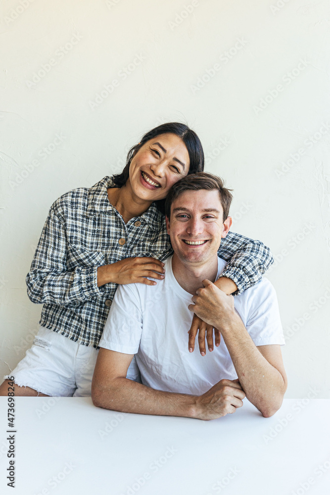 Young couple smiling at camera Young couple smiling at camera