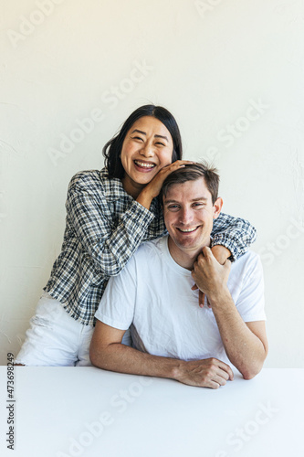 Young couple smiling at camera photo