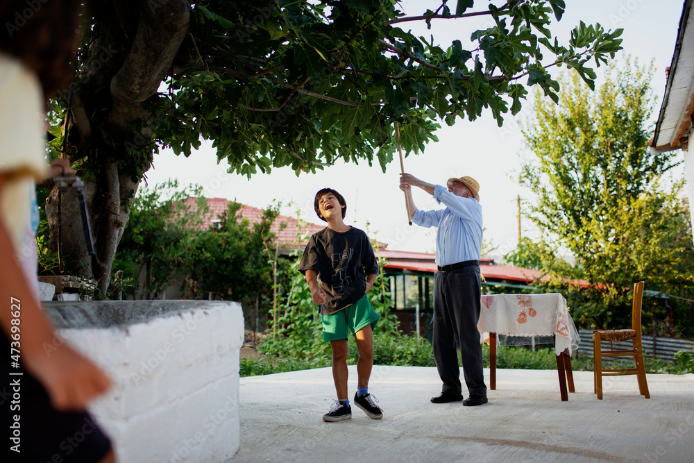 Grandfather having fun with his grandchildren Grandfather having fun with his grandchildren