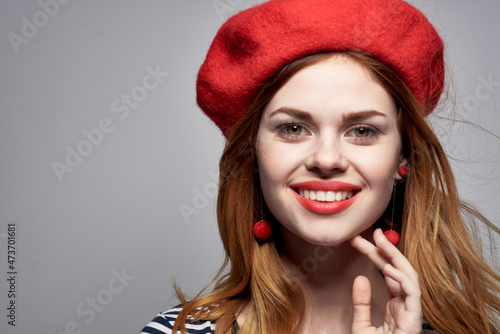 pretty woman wearing a red hat makeup France Europe fashion posing summer
