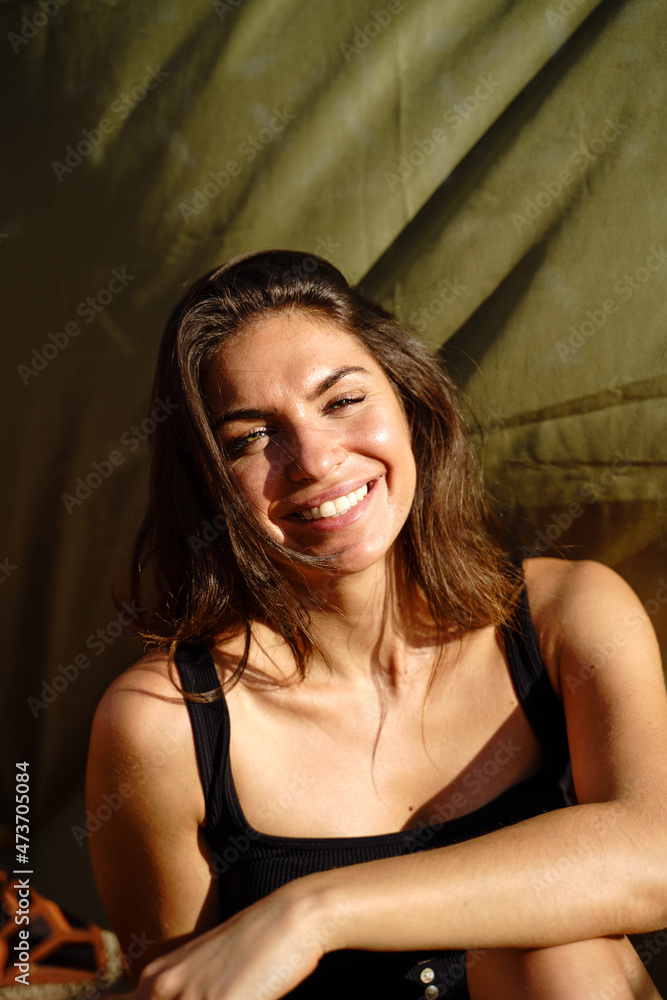 Fashion portrait of smiley beautiful woman on rooftop Fashion portrait of smiley beautiful woman on rooftop
