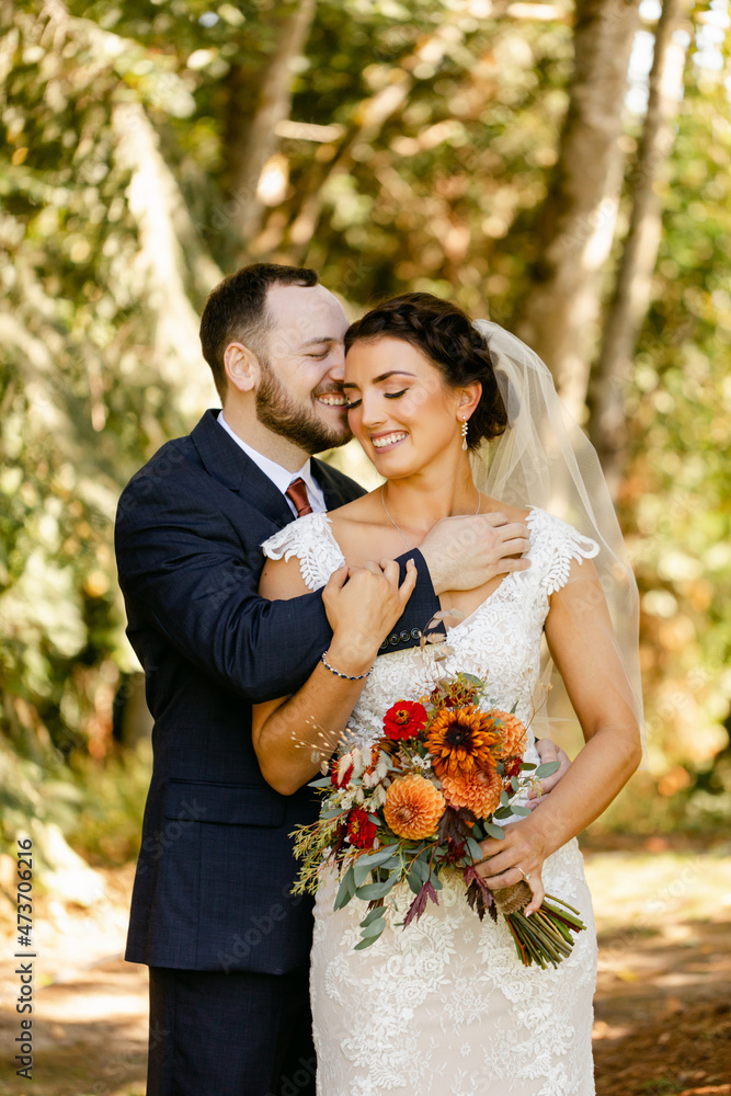 Happy Bride and Groom in Embrace Happy Bride and Groom in Embrace